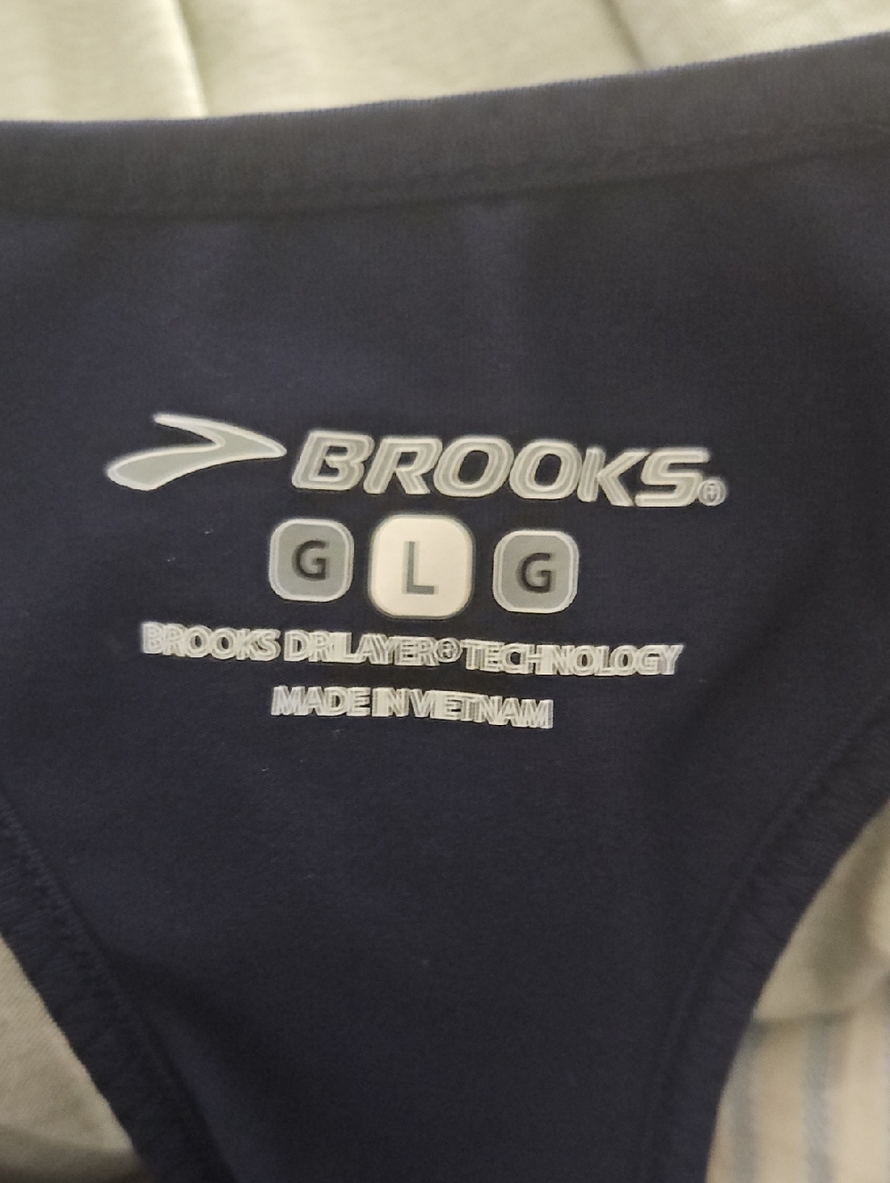 Brooks Navy Performance Racerback Tank - Picture 2 of 3
